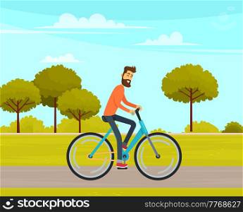 Guy in helmet and sportswear riding in forest. Man rides bicycle on sandy road. Male character doing sports outdoors. Sportsman cycling through trees. Person spends time on background of park. Man rides bicycle on sandy road in forest. Sportsman cycling on background of park landscape