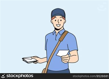 Guy works as postman and with smile holds out envelope with letter to screen, offering to use delivery correspondence. Man in postman clothes makes career in courier service or national postal company. Guy works as postman and with smile holds envelope with letter and delivery correspondence