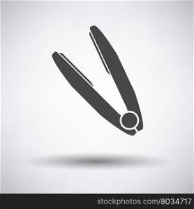 Hair straightener icon on gray background, round shadow. Vector illustration.