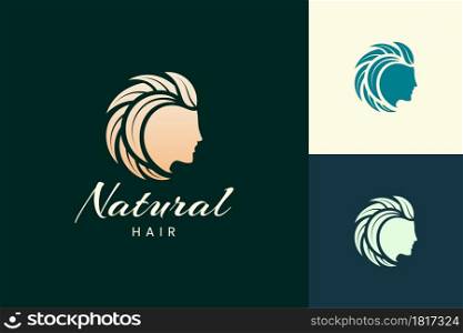 Hairdresser logo with head and leaf hair for salon and beauty brand