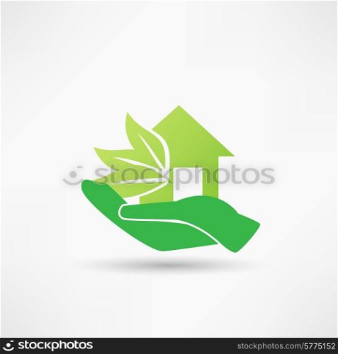 Hand and green house