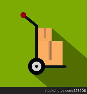 Hand cart with two cardboard boxes icon. Flat illustration of hand cart with two cardboard boxes vector icon for web isolated on lime background. Hand cart with two cardboard boxes icon flat style