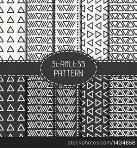 Hand drawn geometric monochrome hipster line seamless pattern with triangle. Wrapping paper. Scrapbook paper. Trendy doodle style. Vector illustration. Background. Stylish graphic texture for design.. Set of hand drawn geometric monochrome hipster line seamless pattern with triangle. Wrapping paper. Scrapbook paper. Trendy doodle style. Vector illustration. Background. Stylish graphic texture for design.