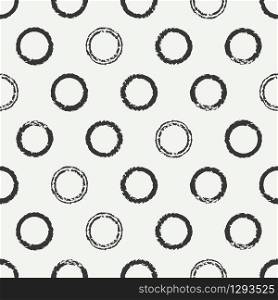 Hand drawn seamless pattern with black grunge rings, circle. Wrapping paper. Abstract vector background. Brush strokes rings. Casual texture. Doodle. Dry brush. Rough edges ink illustration.. Hand drawn seamless pattern with black grunge rings, circle. Wrapping paper. Abstract vector background. Brush strokes ink rings. Casual texture. Doodle. Dry brush. Rough edges ink illustration.