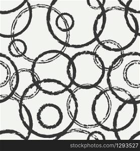 Hand drawn seamless pattern with black grunge rings, circle. Wrapping paper. Abstract vector background. Brush strokes. Texture. Doodle. Dry brush. Rough edges ink illustration. Crossing rings.. Hand drawn seamless pattern with black grunge rings, circle. Wrapping paper. Abstract vector background. Brush strokes. Casual texture. Doodle. Dry brush. Rough edges ink illustration. Crossing rings.