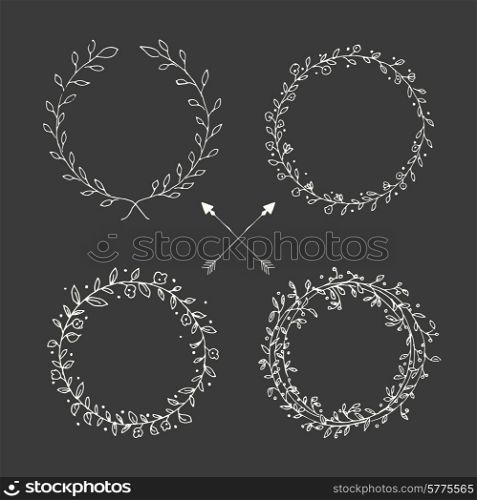Hand drawn vintage arrows, feathers, dividers and floral elements, vector illustration