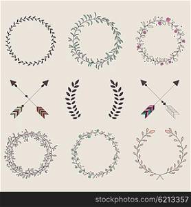 Hand drawn vintage arrows, feathers, dividers and floral elements, vector illustration
