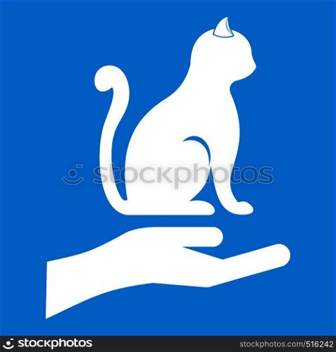 Hand holding a cat icon white isolated on blue background vector illustration. Hand holding a cat icon white