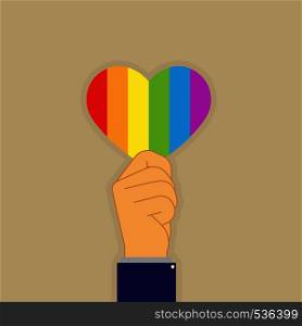 Hand holding a heart in the colors of LGBT, flat design