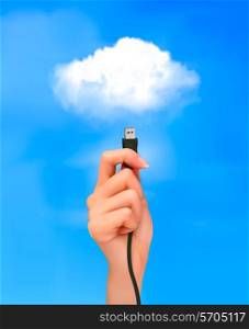 Hand holding cable connected to the cloud. Concept of cloud computing