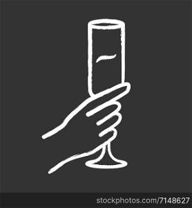 Hand holding champagne glass chalk icon. Champagne flute. Glassful of alcohol beverage. Wine service. Celebration. Wedding. Tasting, degustation. Toast. Cheers. Isolated vector chalkboard illustration