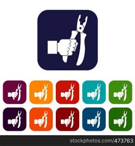 Hand holding chisel icons set vector illustration in flat style In colors red, blue, green and other. Hand holding chisel icons set flat