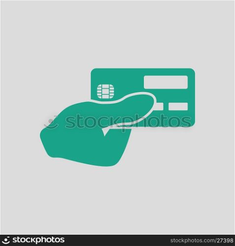 Hand holding credit card icon. Gray background with green. Vector illustration.