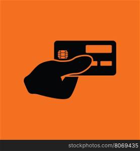 Hand holding credit card icon. Orange background with black. Vector illustration.