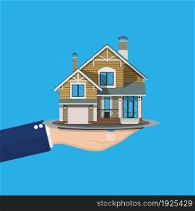 hand holding house. Buying or selling a house, real estate. vector illustration in flat style. hand holding house
