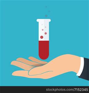 hand holding laboratory filled with a clear liquid and blue background
