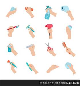 Hand holding objects icons set. Hand holding household objects and hygiene accessories icons set flat isolated vector illustration