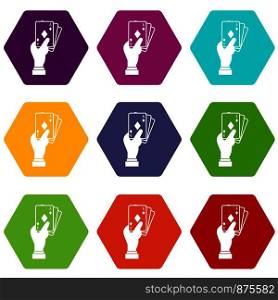 Hand holding playing cards icon set many color hexahedron isolated on white vector illustration. Hand holding playing cards icon set color hexahedron