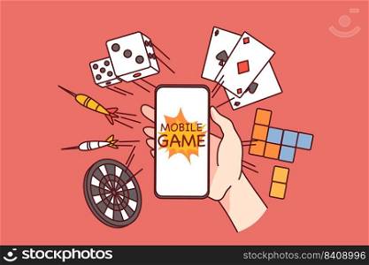 Hand holding smartphone with online gaming applications. Person addicted to internet games on cellphone. Gambling and addiction concept. Vector illustration.. Hand holding cell gambling online