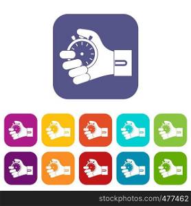 Hand holding stopwatch icons set vector illustration in flat style in colors red, blue, green, and other. Hand holding stopwatch icons set