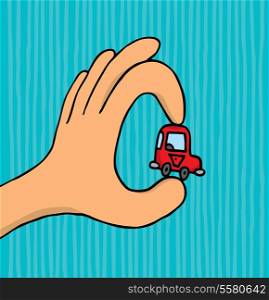Hand holding tiny car