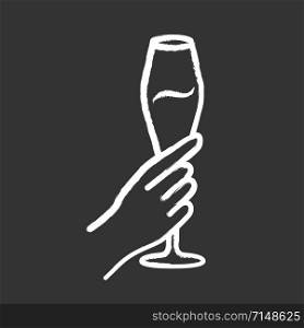 Hand holding tulip glass of wine chalk icon. Champagne flute. Glassful of alcohol drink. Wine service. Celebration, party. Wedding. Cheers. Degustation. Isolated vector chalkboard illustration