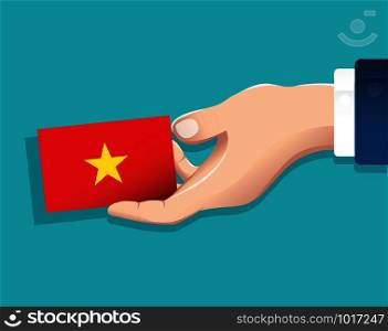 hand holding Vietnam flag card with blue background. vector illustration eps10