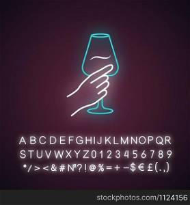 Hand holding wine glass blue neon light icon. Glassful of alcohol beverage. Wine service. Glassware. Toast. Glowing sign with alphabet, numbers and symbols. Vector isolated illustration