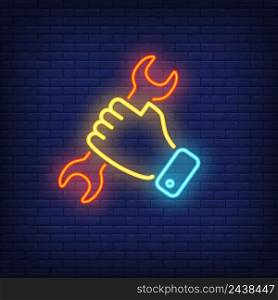 Hand holding wrench. Neon sign element. Labor day concept. Vector illustration for repairing, technical support, car service