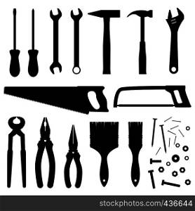 Hand industrial and building tools vector silhouettes. Handyman toolkit. Screwdriver and wrench, hammer instrument and saw illustration. Hand industrial and building tools vector silhouettes. Handyman toolkit