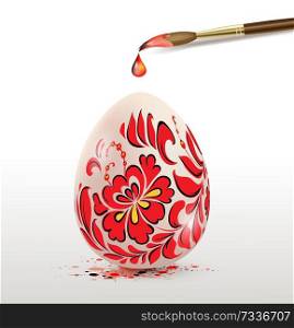 Hand painted decorative Easter egg with red floral ornament and paintbrush. Ukrainian traditional folk painting art style. Realistic vector illustration.