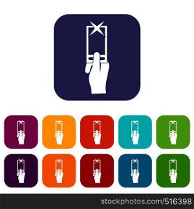 Hand photographs on smartphone icons set vector illustration in flat style in colors red, blue, green, and other. Hand photographs on smartphone icons set