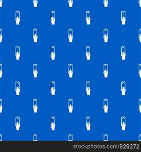 Hand photographs on smartphone pattern repeat seamless in blue color for any design. Vector geometric illustration. Hand photographs on smartphone pattern seamless blue