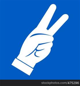 Hand showing victory sign icon white isolated on blue background vector illustration. Hand showing victory sign icon white