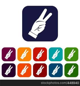 Hand showing victory sign icons set vector illustration in flat style In colors red, blue, green and other. Hand showing victory sign icons set flat