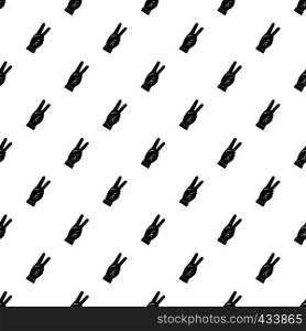 Hand showing victory sign pattern seamless in simple style vector illustration. Hand showing victory sign pattern vector