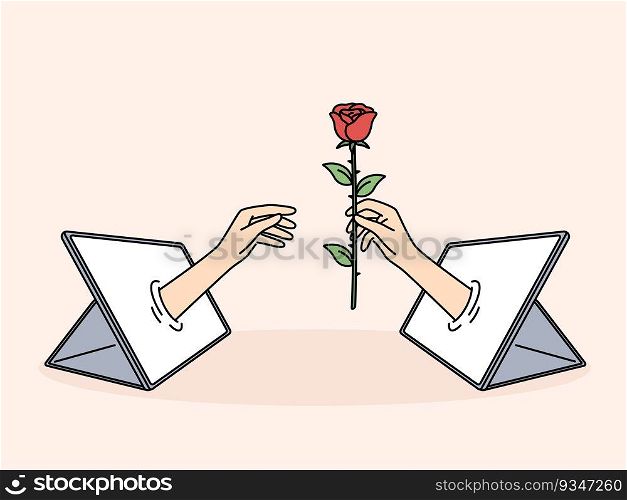 Hand with rose in tablet is metaphor for online relationships and dating using digital gadgets. Online flirting and sending virtual gifts through social network app for distance relationships concept. Hand with rose in tablet is metaphor for online relationships and dating using digital gadgets
