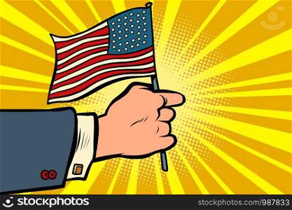 hand with the American flag. Independence day. Patriotic symbol. comic cartoon pop art retro vector illustration drawing. hand with the American flag. Independence day. Patriotic symbol