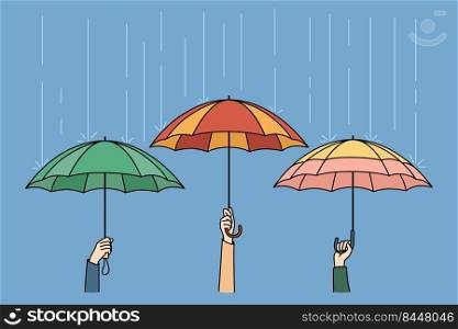 Hands holding colorful umbrellas hiding from rain in city. People outside on rainy weather. Storm and safety concept. Vector illustration.. People holding umbrellas on rainy weather