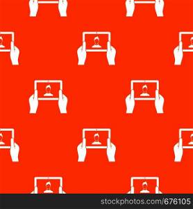 Hands holding tablet pattern repeat seamless in orange color for any design. Vector geometric illustration. Hands holding tablet pattern seamless
