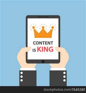 Hands holding tablet with words CONTENT IS KING, seo search engine optimization and content marketing concept