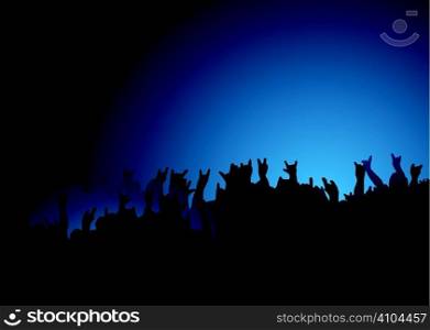 Hands raised at a rock concert with the crown back lit in blue