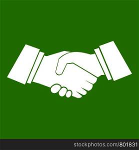 Handshake icon white isolated on green background. Vector illustration. Handshake icon green