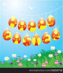 Hanging Easter eggs on spring blue sky background