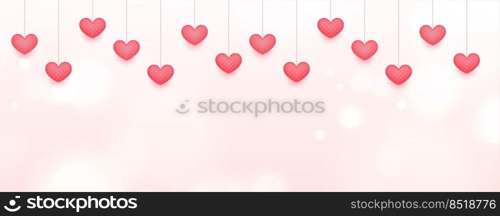 hanging love hearts on pink bokeh banner design