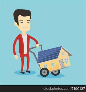 Happy asian man pushing a shopping trolley with a house. Young smiling man buying new house. Man using shopping trolley to transport a small house. Vector flat design illustration. Square layout.. Young man buying house vector illustration.