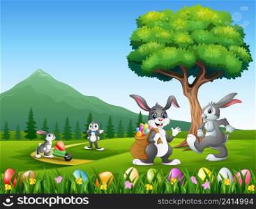 Happy bunnies playing on the nature background