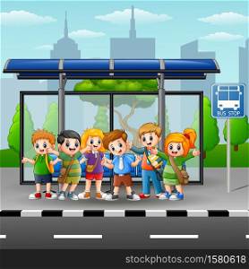 Happy children in a bus stop