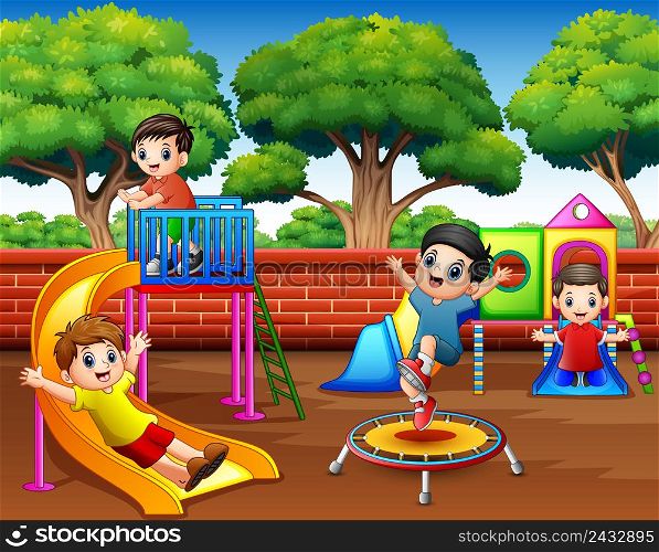 Happy children playing in the playground at daytime