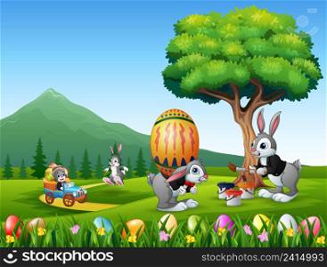 Happy easter bunnies painting and holding egg